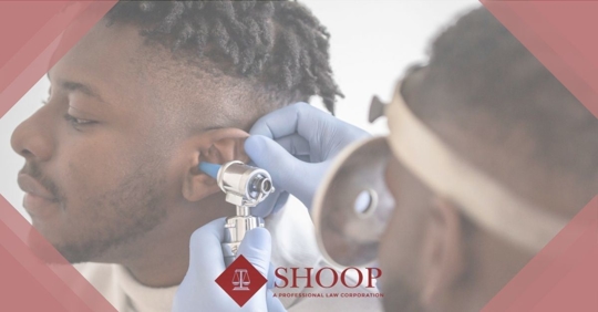 Man getting his ear checked