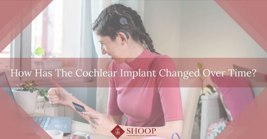 girl with cochlear implant looking at her laptop