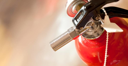 a close-up of a fire extinguisher